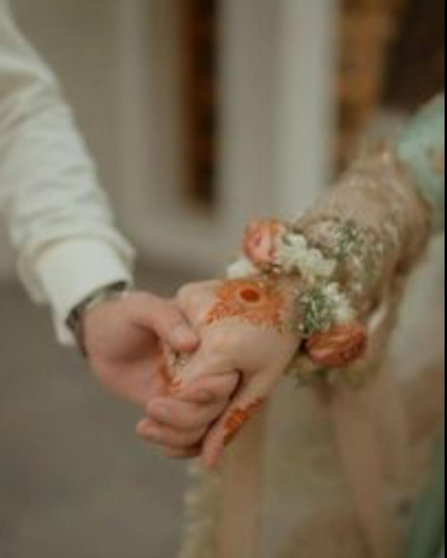 Indian wedding couple hands closeup